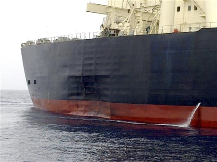 In this photo released by the Emirates News Agency, damage is seen on the side of the "M. Star" oil supertanker as it arrives at Fujairah port in the United Arab Emirates on Wednesday.